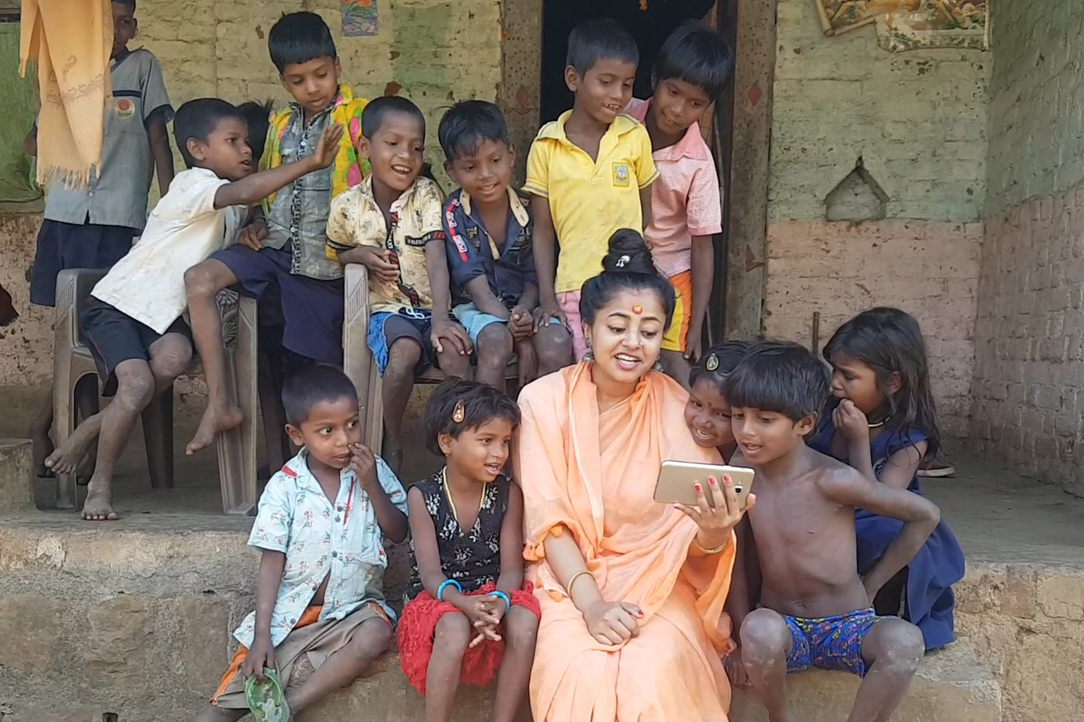 guruma with tribal children